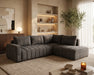 Divan lit sectionnel DARIO en tissu gris foncé, dans une chambre contemporaine