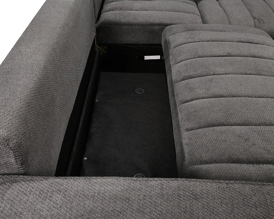 Zoom sur le coffre de rangement intégré du sectionnel DARIO gris foncé