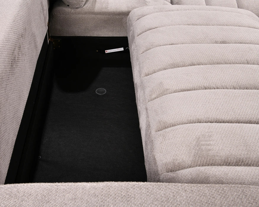 Zoom sur le coffre de rangement intégré du sectionnel DARIO gris