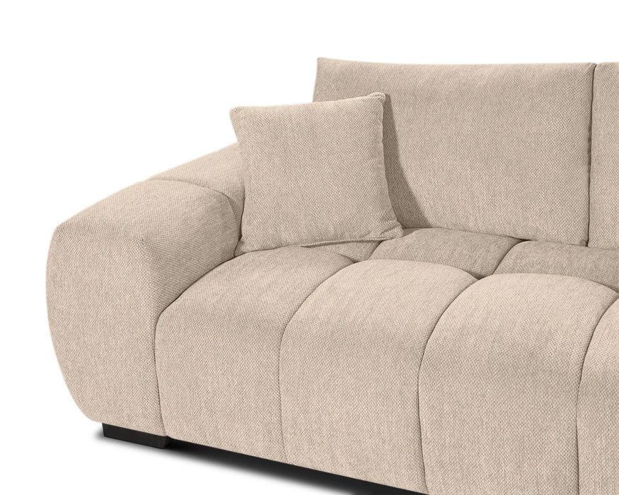 Gros plan sur le tissu polyester texturé beige sable du divan Olivia