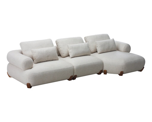 Sofa modulaire LAURENT en tissu bouclé crème, vue en angle
