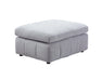 Pouf ottoman ENZO gris clair vue en angle, tissu capitonné vertical, pieds noirs