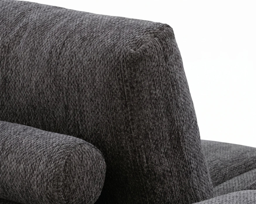 Gros plan sur le tissu polyester capitonné gris foncé du divan OLIVIA