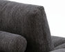 Gros plan sur le tissu polyester capitonné gris foncé du divan OLIVIA