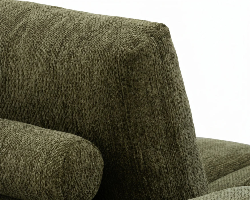 Gros plan sur le tissu polyester capitonné vert du divan OLIVIA