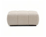Ottoman capitonné OLIVIA beige crème avec pieds noirs, vue de face